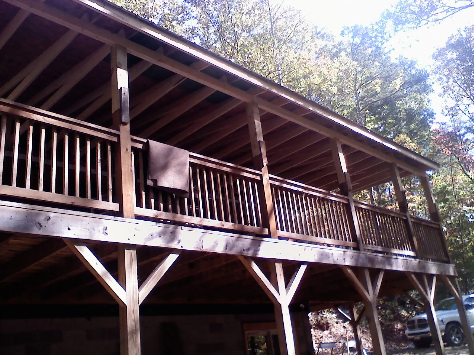 Timber framing under a new elevated porch and deck — Roof Leak Repair in Valley Falls by Roofing Brothers